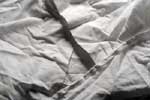 Wiping cloths of recycled white sheets for cleanup of spills and leaks