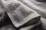 White cotton bar towels for cleaning up spills, leaks and general janitorial cleaning